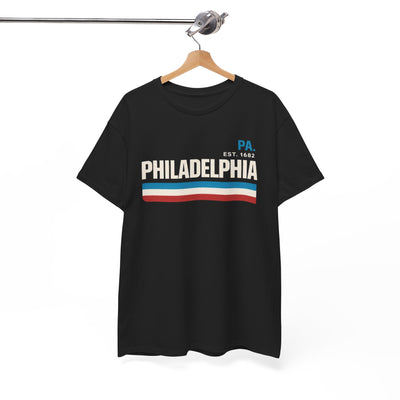 Black t-shirt with 'Philadelphia' and 'PA' text on a hanger against a white background