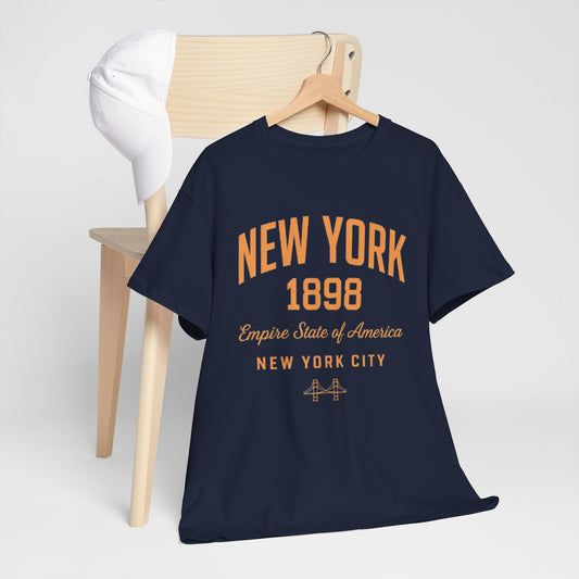 Navy blue t-shirt with orange text on a wooden hanger against a white background