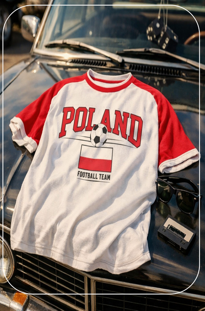 White and red t-shirt with 'Poland Football Team' text on a car hood.