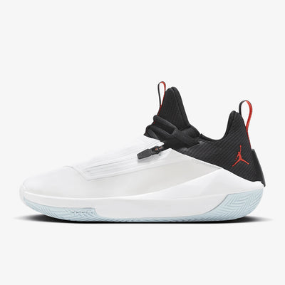 Basketball shoe with black and red accents on a white background