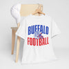 White t-shirt with 'Buffalo Football' text on a wooden chair against a white background