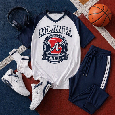 Atlanta-themed clothing set with t-shirt, shorts, sneakers, socks, and headphones on a basketball court background.