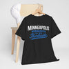 Navy blue t-shirt with 'Minneapolis Minnesota Est. 1858 Northside' text on a wooden chair.