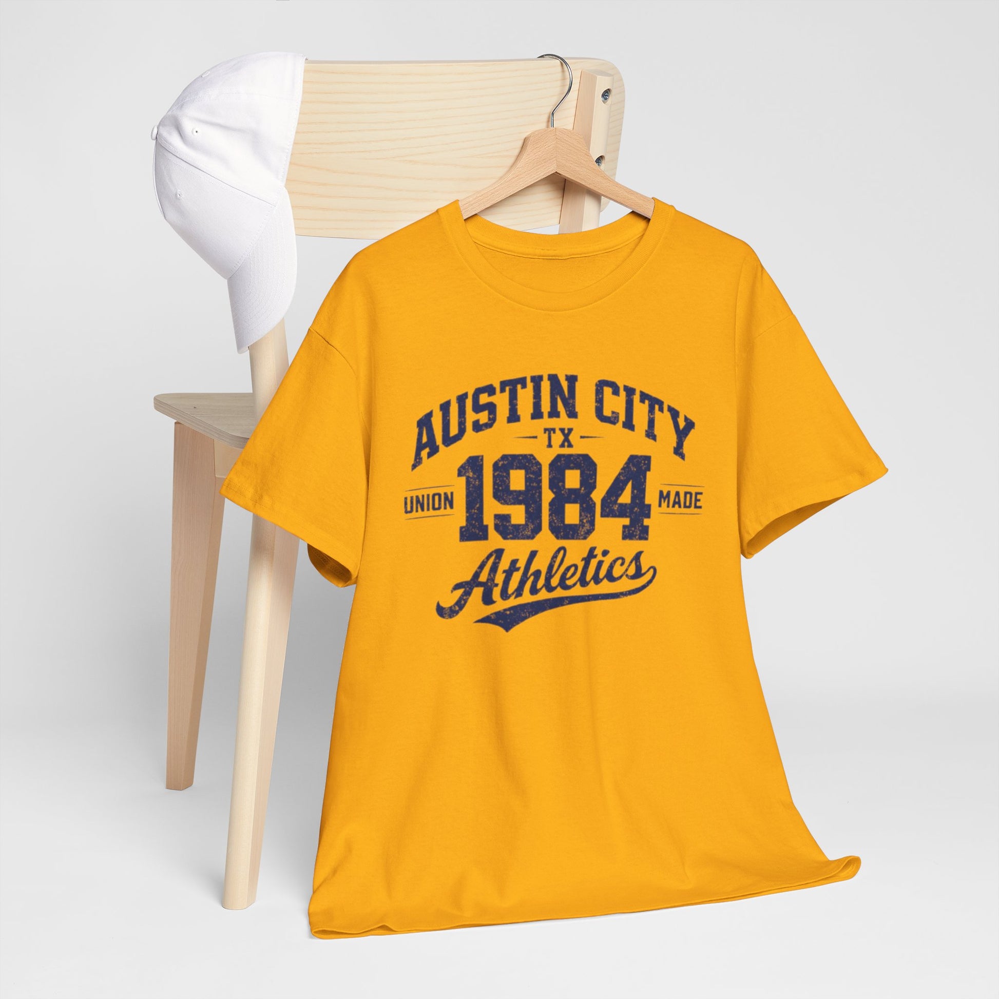 Goldenrod Austin City 1984 Athletics Tee — Vintage Collegiate Graphic T-Shirt