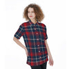 Woman wearing a red and blue plaid shirt on a white background
