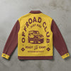 Yellow and maroon jacket with 'Offroad Club' text and jeep graphic on a concrete surface