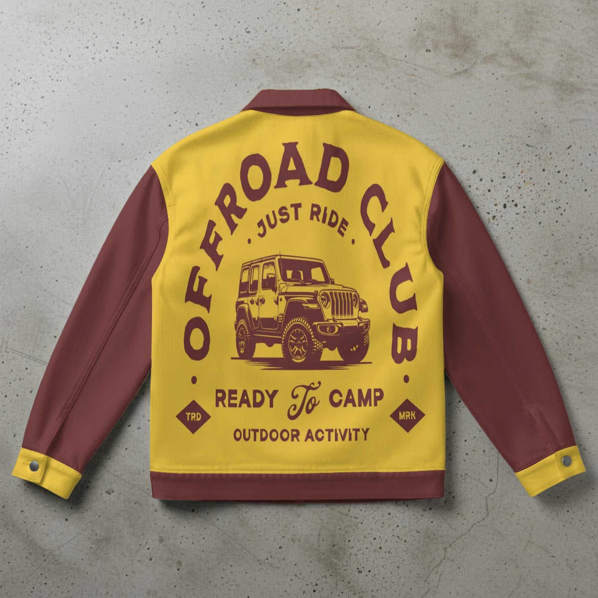 Yellow and maroon jacket with 'Offroad Club' text and jeep graphic on a concrete surface