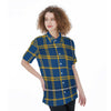 Woman wearing a blue and yellow plaid shirt on a white background