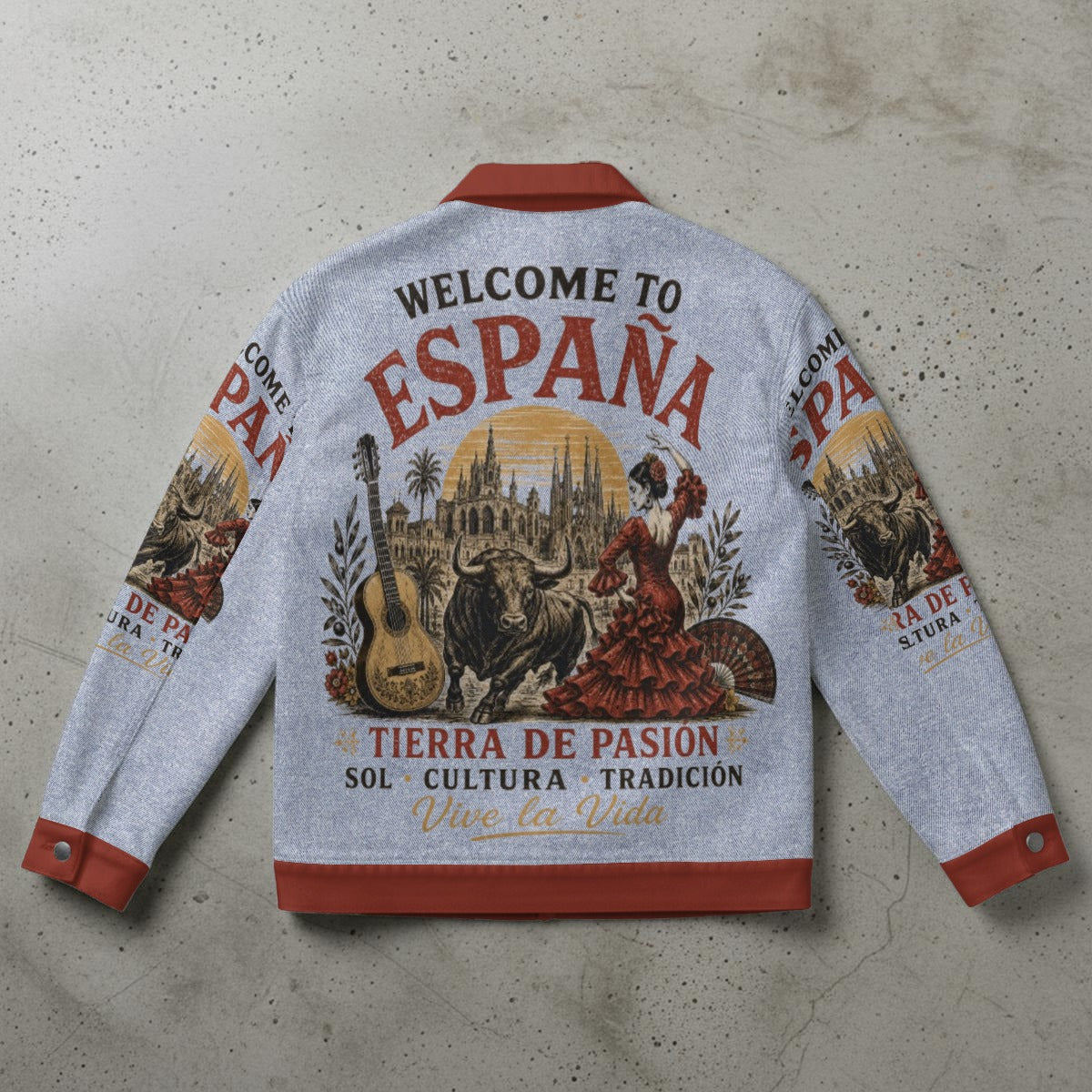 Gray jacket with Spanish-themed graphics and text on a concrete surface