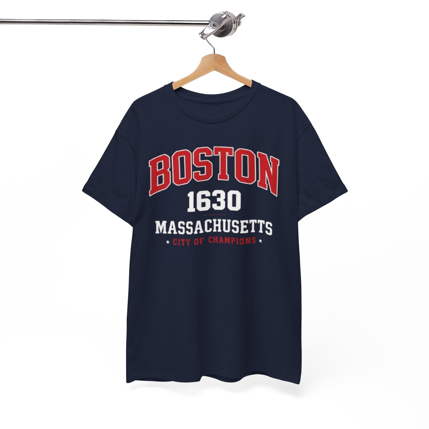 Navy blue t-shirt with 'Boston 1630 Massachusetts City of Champions' text on a hanger against a white background