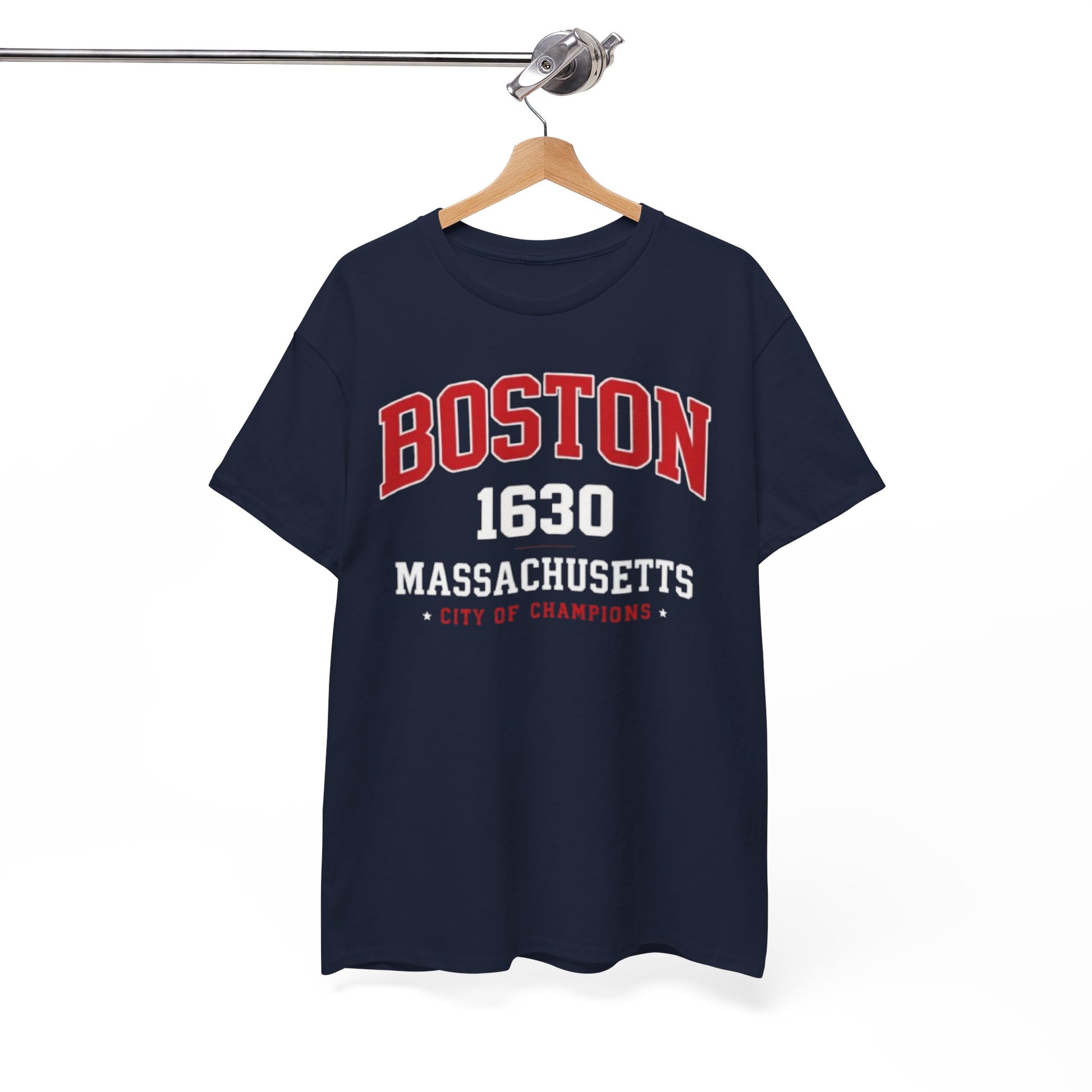 Navy blue t-shirt with 'Boston 1630 Massachusetts City of Champions' text on a hanger against a white background