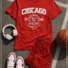 Red 'Chicago' t-shirt with shorts, sneakers, and basketball on a court