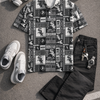 Fashionable outfit with patterned shirt, black jeans, white sneakers, and accessories on a gray surface.