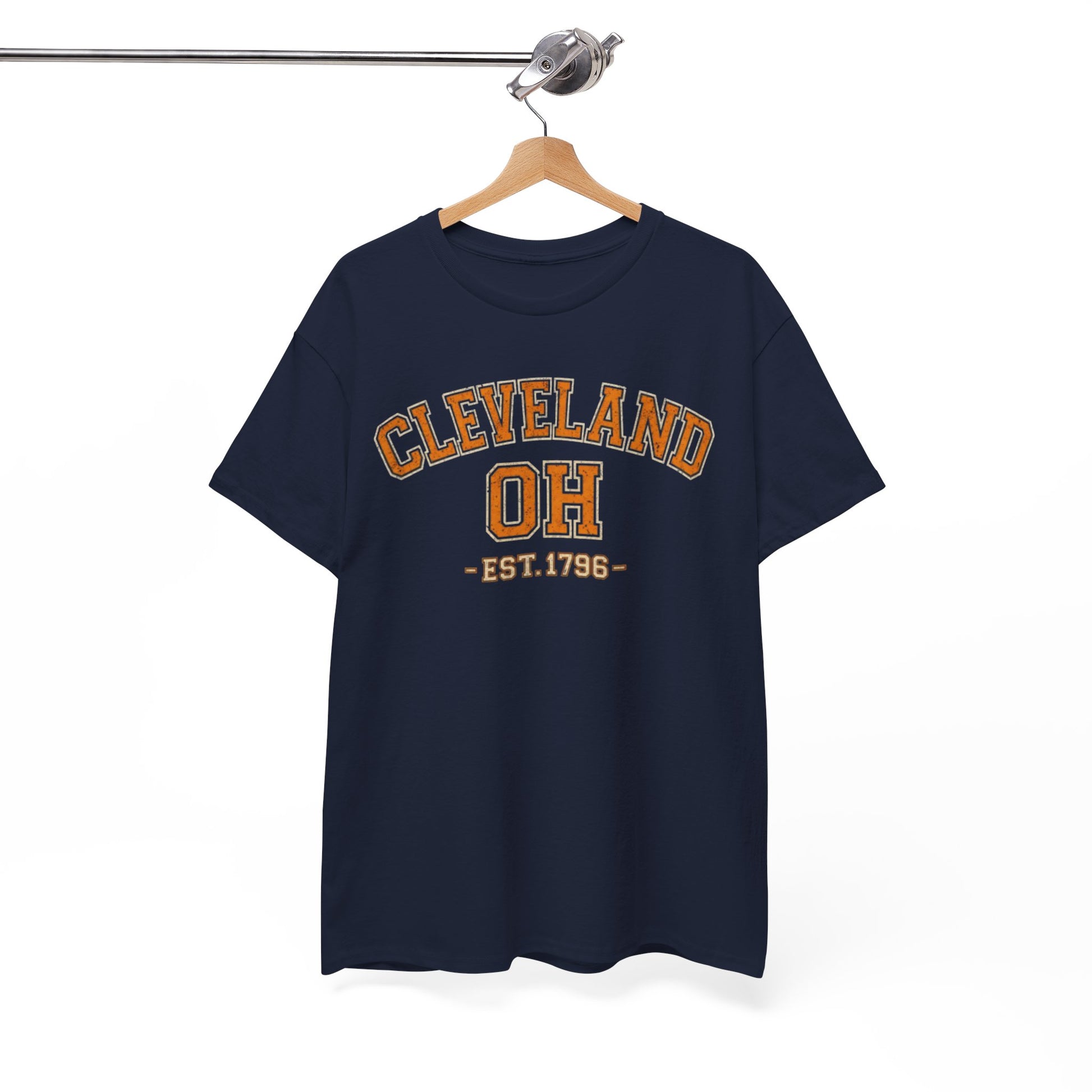 Navy blue t-shirt with 'Cleveland OH EST. 1796' text on a hanger against a white background
