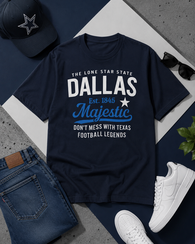 Navy blue t-shirt with 'Dallas' text, cap, jeans, and sneakers on a gray surface