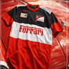 Ferrari shirt on a red car with visible logos