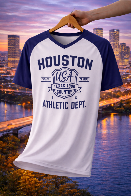 White and blue t-shirt with 'Houston Athletic Dept.' text against a cityscape background