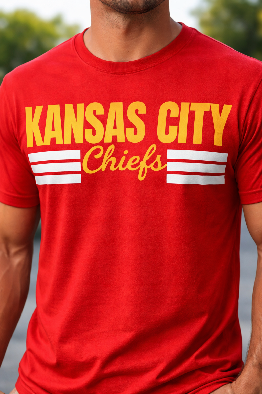Red t-shirt with 'Kansas City Chiefs' printed on it, worn by a person.