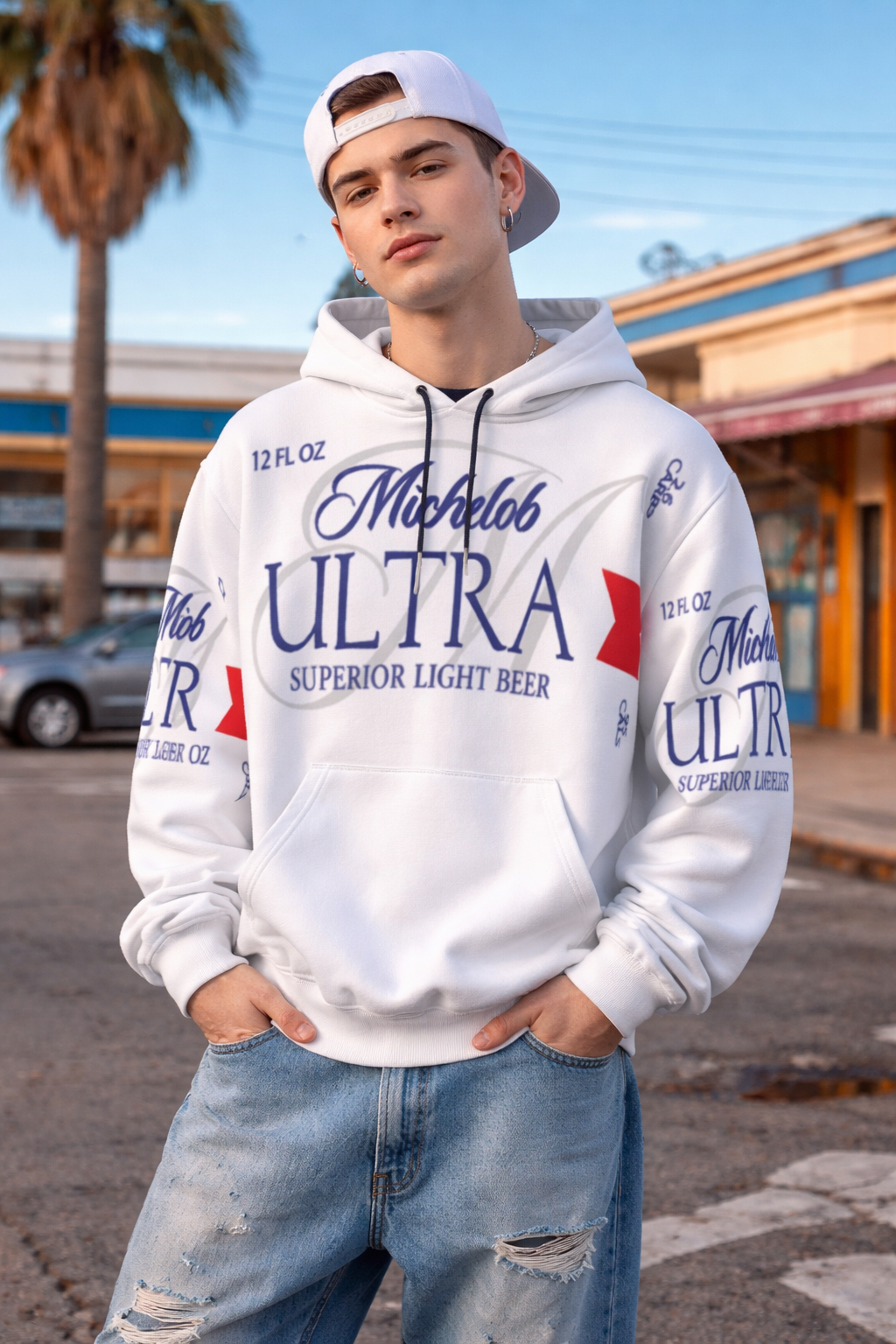 Person wearing a white Michelob Ultra hoodie in an outdoor setting
