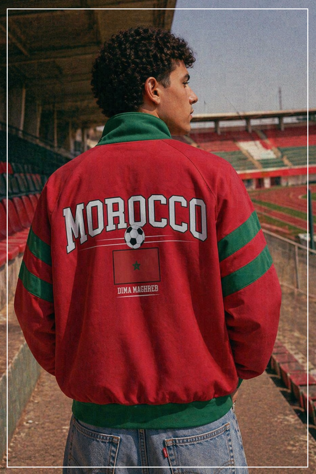 Person wearing a red 'Morocco' jacket in an outdoor stadium setting