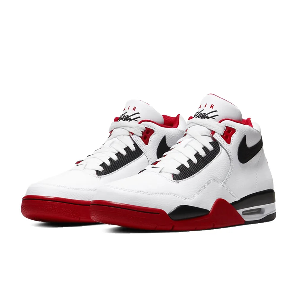 White sneakers with red and black accents on a white background