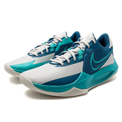 Pair of blue and white Nike basketball shoes on a white background