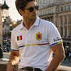 Man wearing a white polo shirt with flags in an urban setting