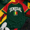 Green 'Senegal' t-shirt with flag design on a colorful background